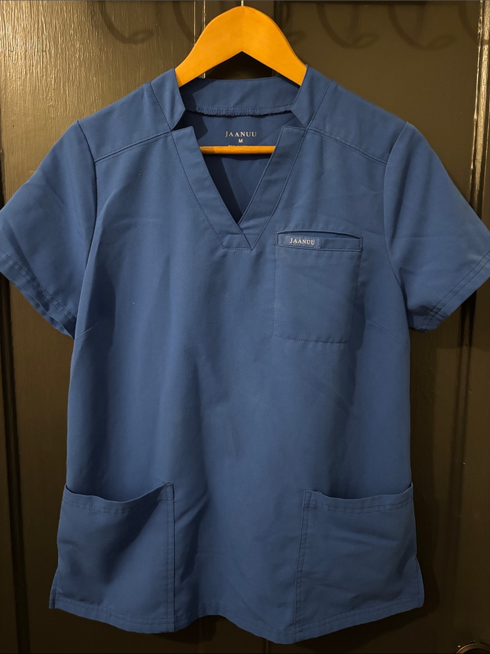 Size Medium Women’s Jaanuu Royal Blue V-Neck Scrub Top